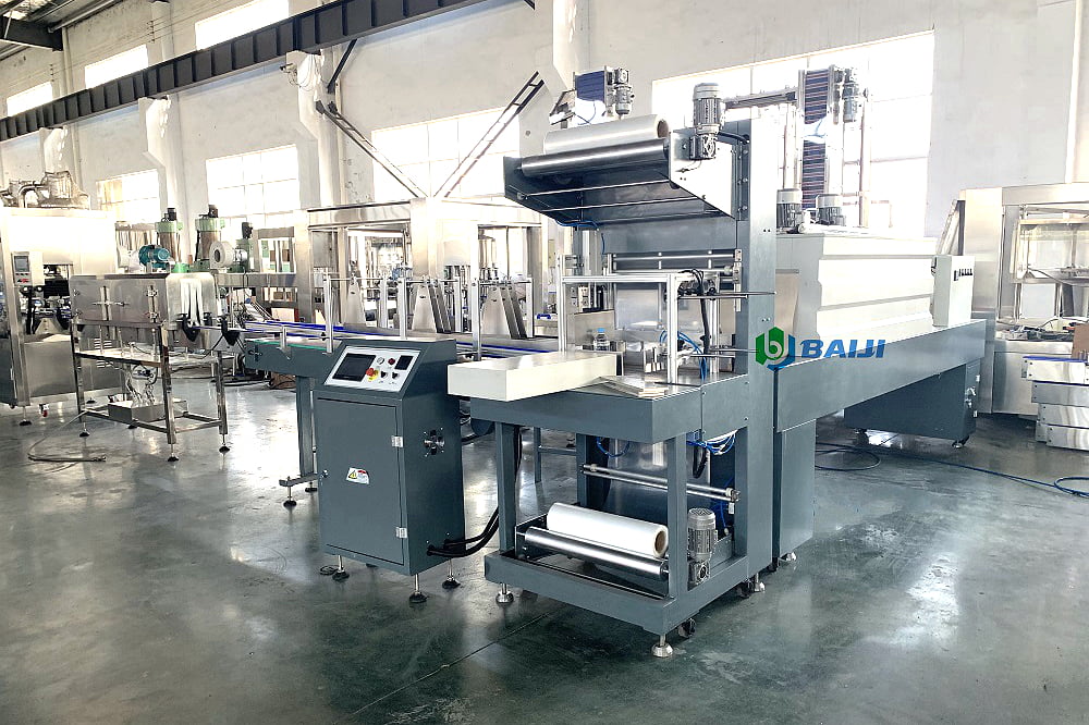 PE film wrapping packing packaging machine for plastic PET bottle glass bottle aluminum can.jpg