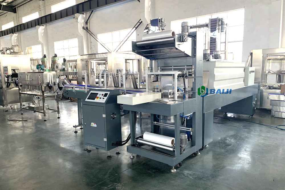 PE film wrapping packing packaging machine for plastic PET bottle glass bottle aluminum can.jpg