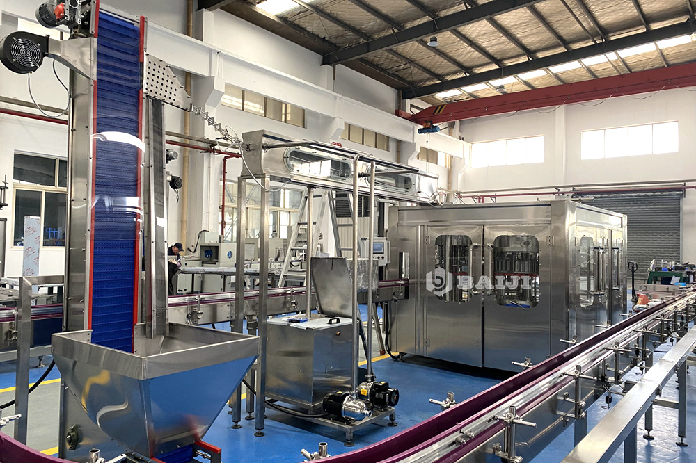 Cola carbonated soft drink sparkling water bottle washing filling and capping machine.JPG