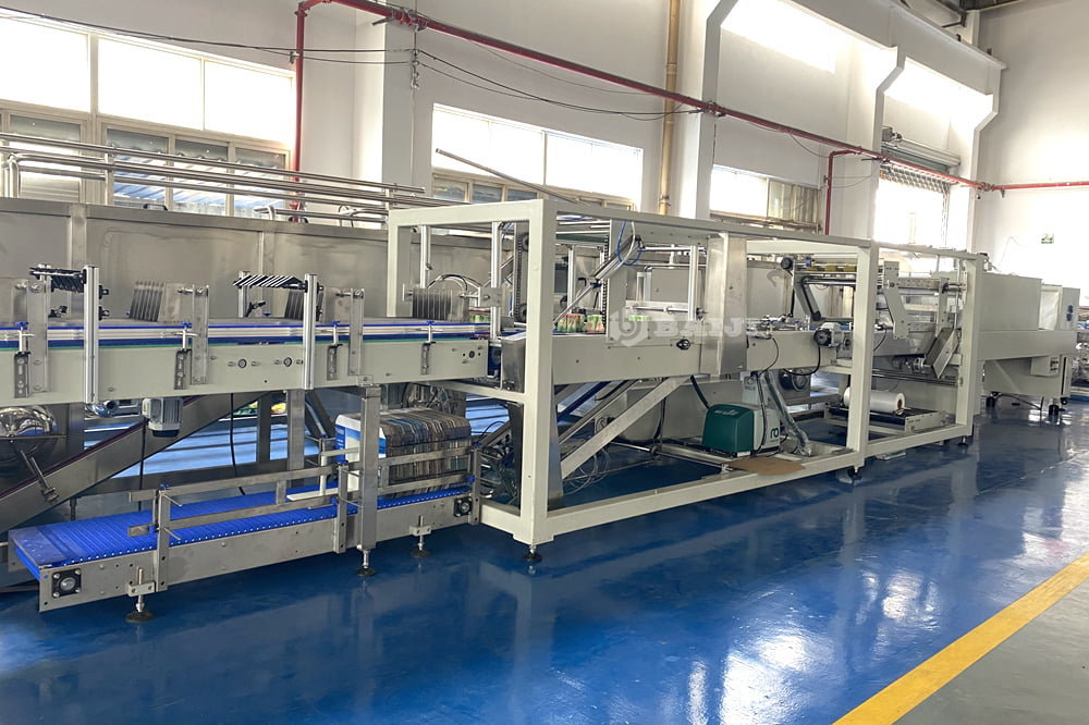 half tray with PE film packing packaging wrapping machine for plastic PET bottle glass bottle aluminum can.JPG
