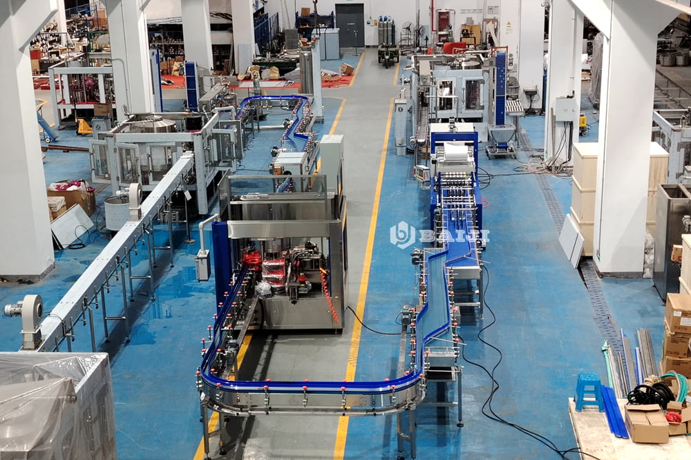 pure mineral drinking water bottle washing filling and capping bottling machine production line.jpg