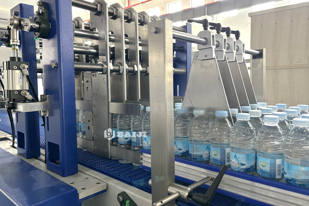 500ml water plastic PET bottle PE film wrapping packaging packing machine aluminum can.JPG